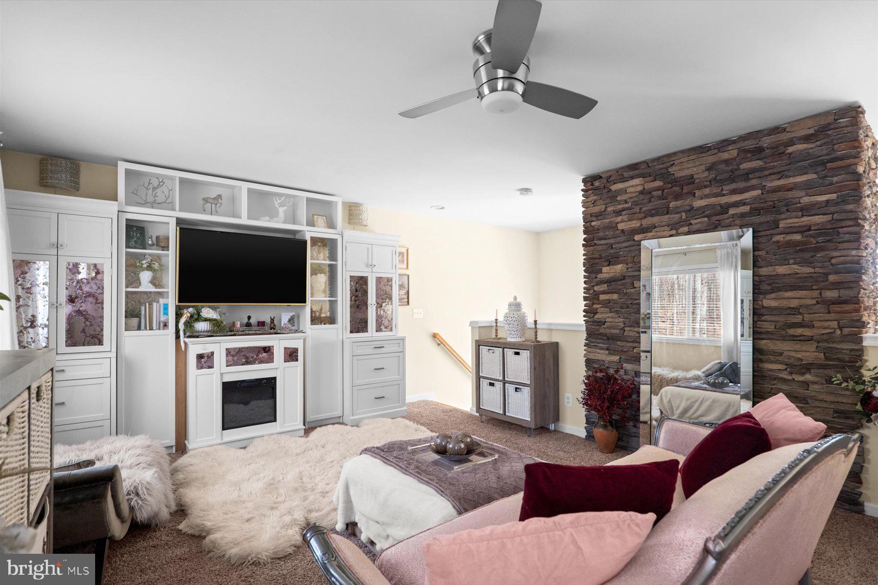 6246 John Barton Payne Road Marshall, VA 20115 - Photo 22 of 32 a living room with furniture and a flat screen tv