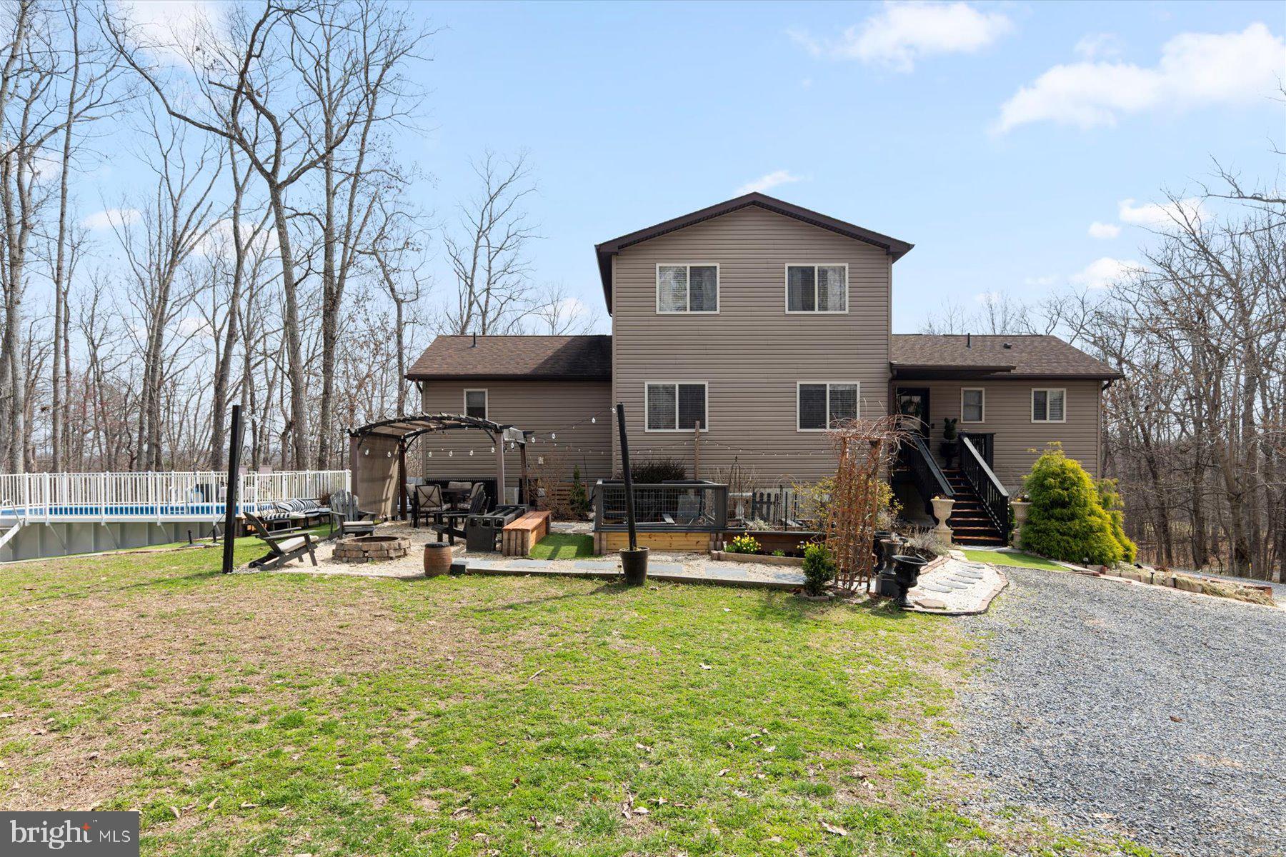 6246 John Barton Payne Road Marshall, VA 20115 - Photo 29 of 32 a view of a house with swimming pool and sitting area