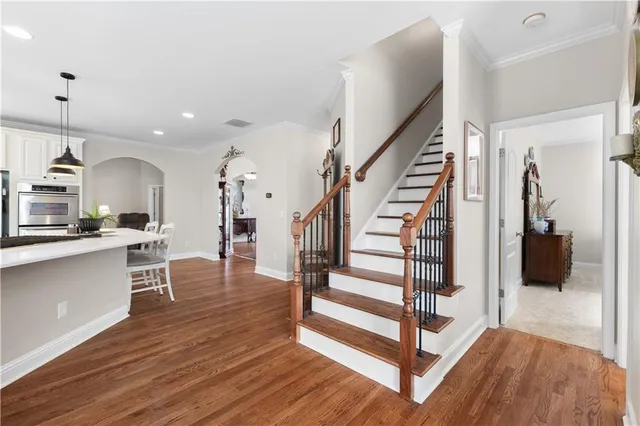 a view of a hallway with washer and dryer