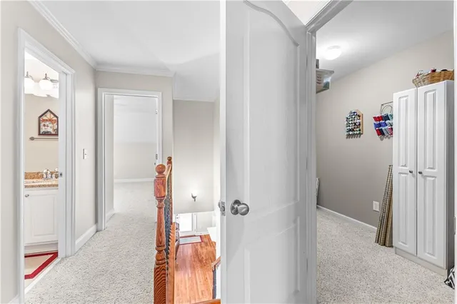 a view of a hallway with front door