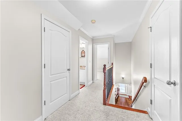 a bathroom with a granite countertop toilet a sink and a mirror