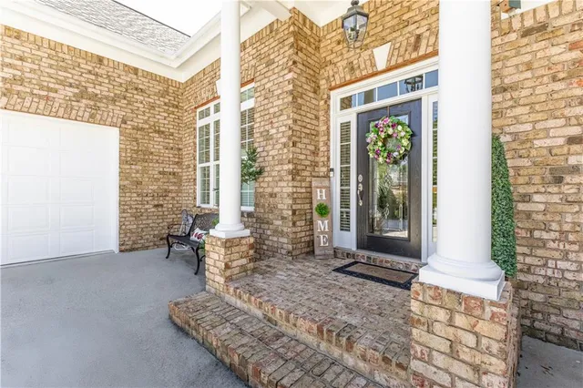 a view of a porch with a bench