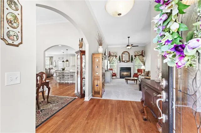 a view of lobby with furniture and wooden floor