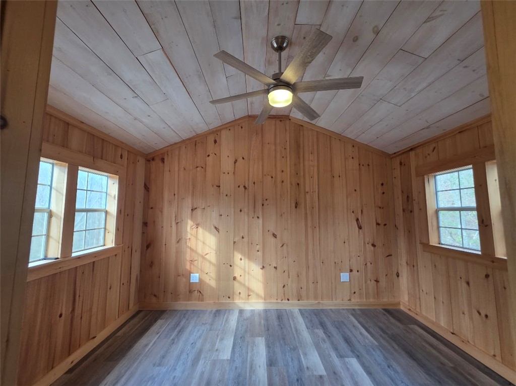 400 Mill Creek Road Sunset, SC 29685 - Photo 4 of 8 Natural wood paneling and vaulted ceilings define this inviting interior space.