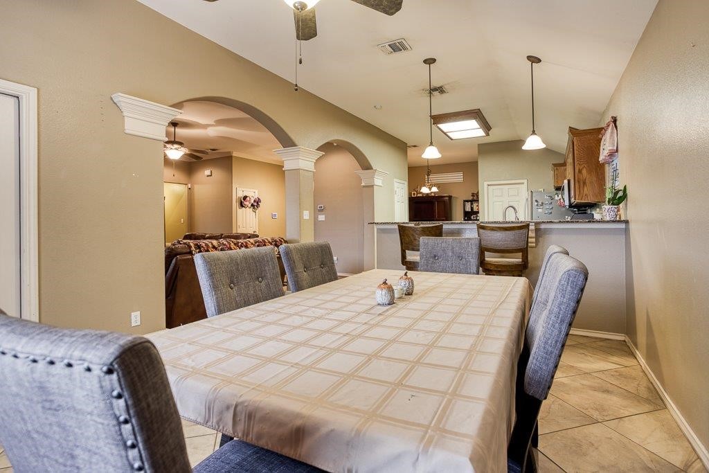 314 Hancock Odem, TX 78370 - Photo 15 of 40 a large kitchen with a table and chairs