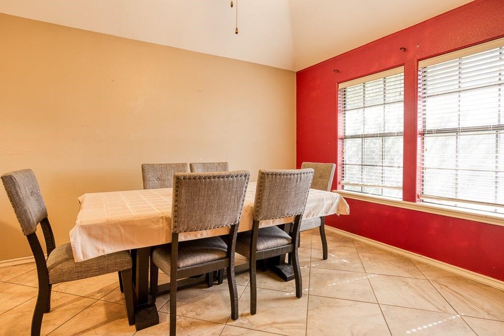 314 Hancock Odem, TX 78370 - Photo 17 of 40 a view of a dining room with furniture and a window