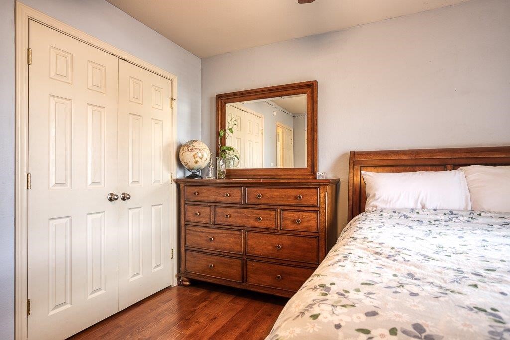 314 Hancock Odem, TX 78370 - Photo 22 of 40 a bedroom with a bed and a dresser