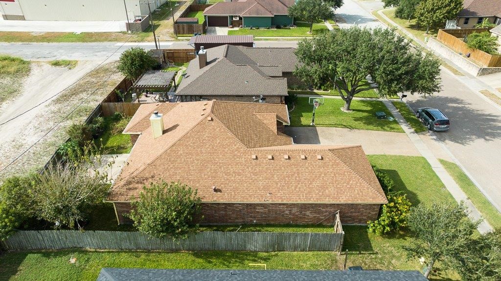 314 Hancock Odem, TX 78370 - Photo 35 of 40 an aerial view of a house with swimming pool and large trees