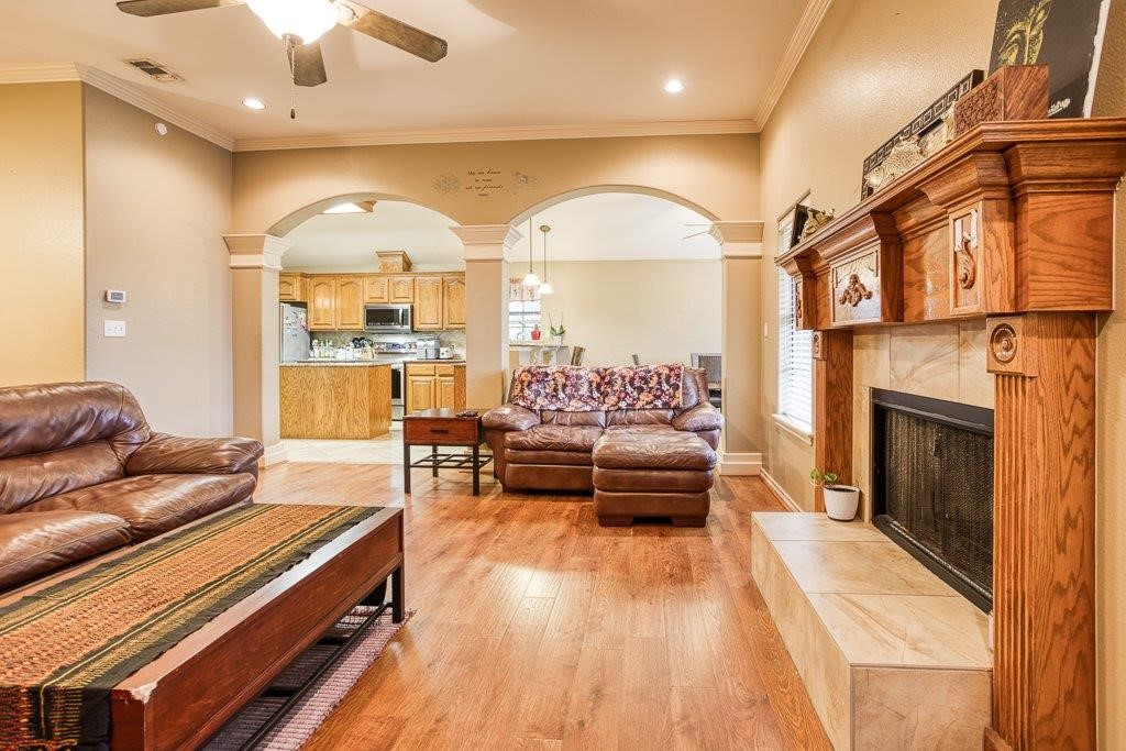 314 Hancock Odem, TX 78370 - Photo 8 of 40 a living room with furniture and a fireplace
