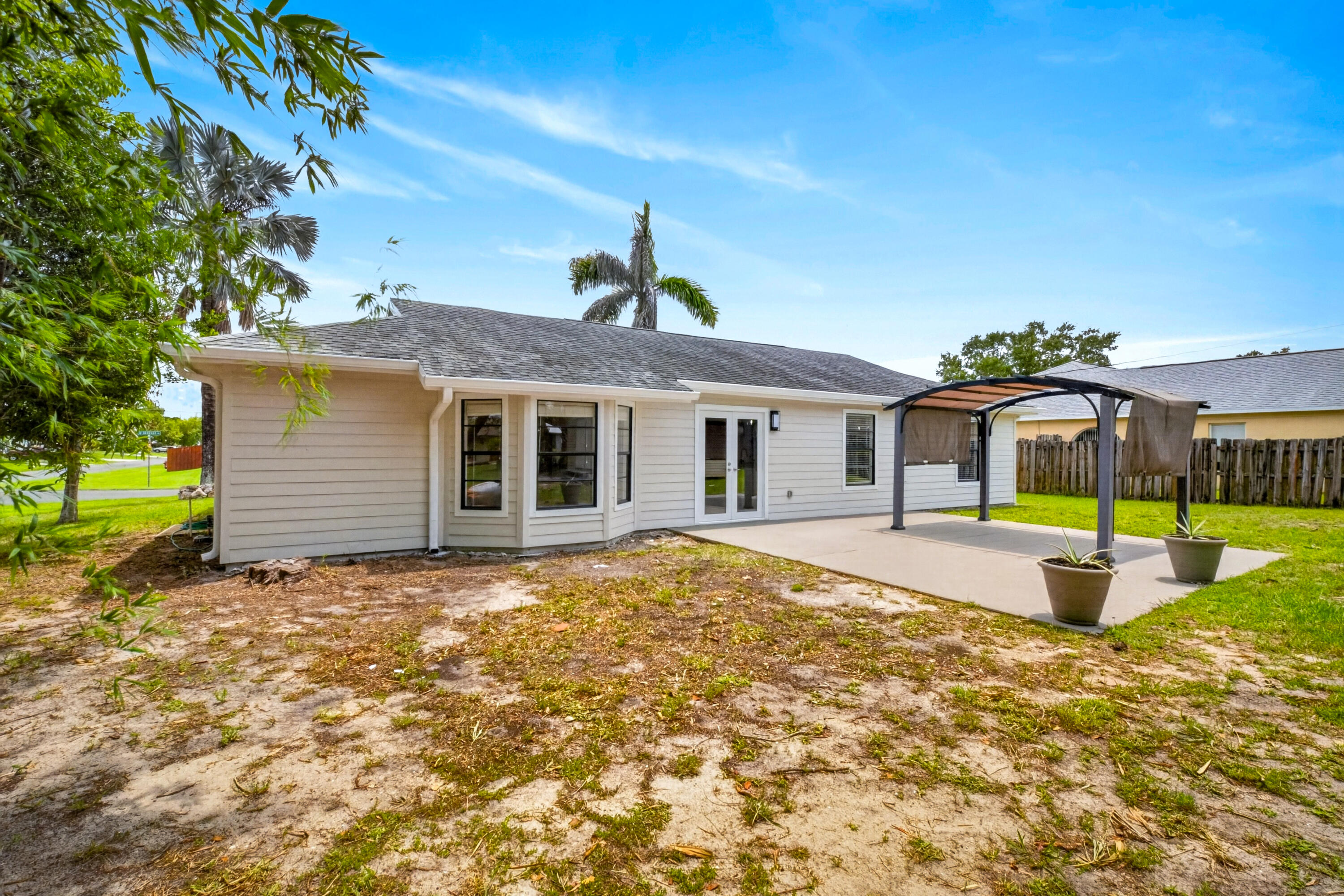801 Southwest Harvard Road Port St. Lucie, FL 34953 - Photo 37 of 49 Back of Home