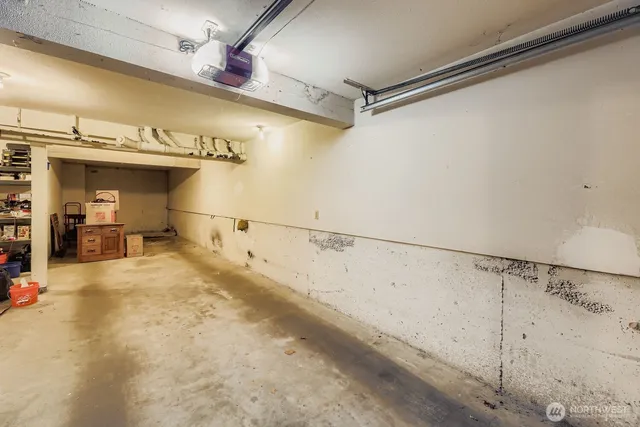 a view of a backyard with garden and patio