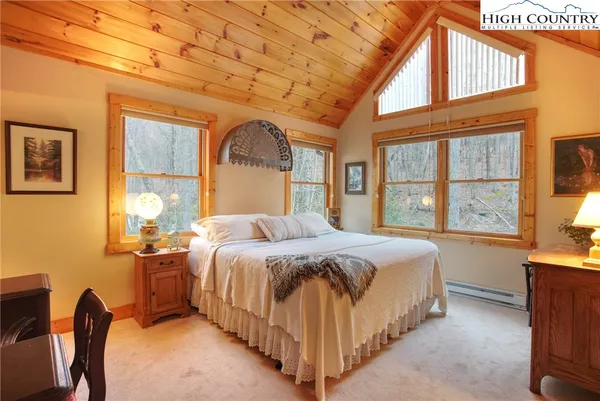 a view of a street with an entrance and a building
