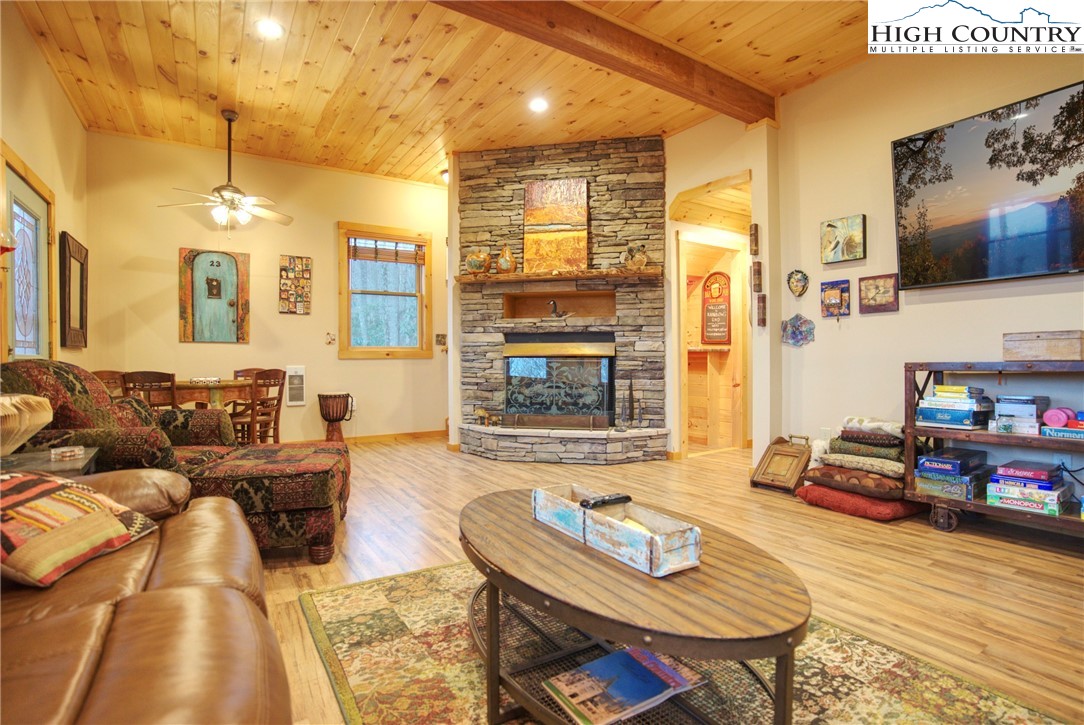 167 Rhododendron Drive Beech Mountain, NC 28604 - Photo 28 of 46 a living room with furniture and a flat screen tv