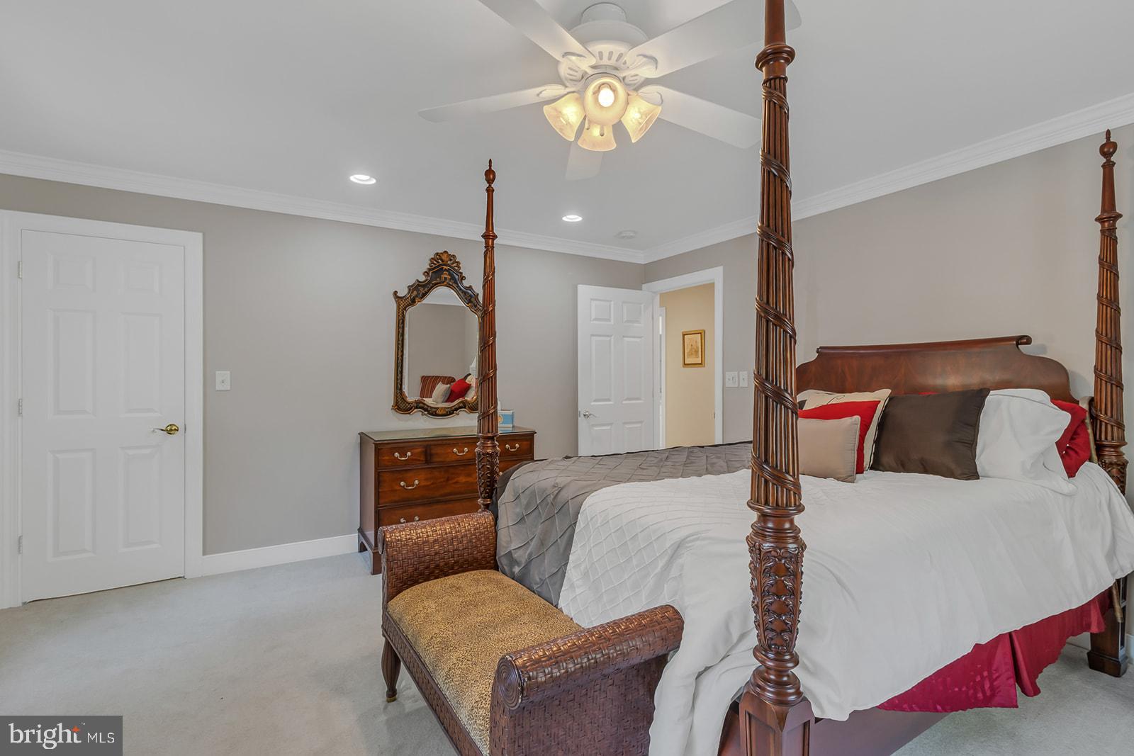 710 Train Lane Heathsville, VA 22473 - Photo 27 of 59 a bedroom with a bed and ceiling fan