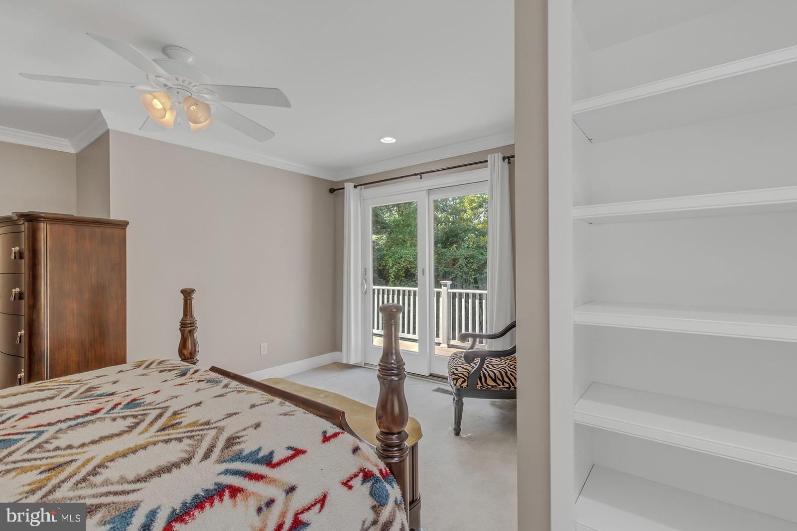 710 Train Lane Heathsville, VA 22473 - Photo 29 of 59 a bedroom with a bed and a large window