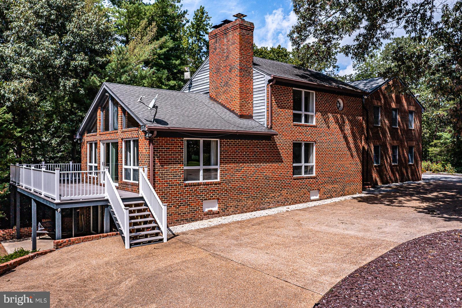 710 Train Lane Heathsville, VA 22473 - Photo 3 of 59 a front view of a house with a garage
