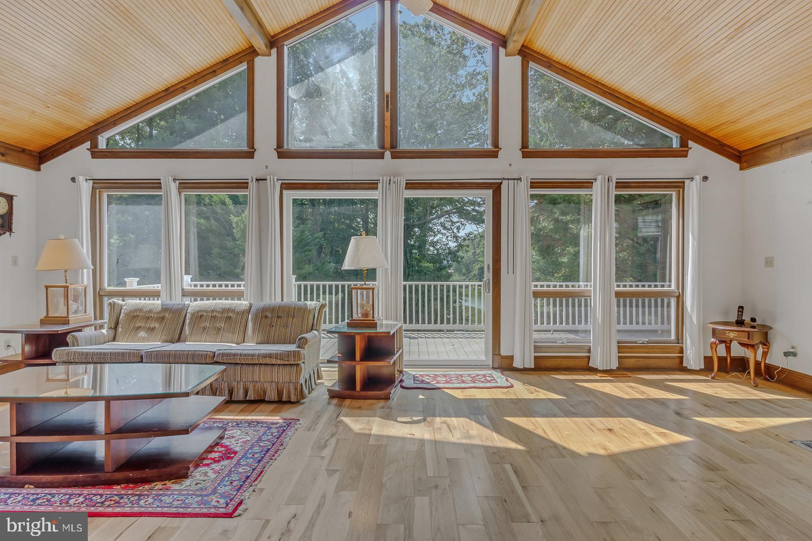 710 Train Lane Heathsville, VA 22473 - Photo 6 of 59 a living room with furniture and a large window