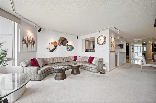 a living room with furniture and a table