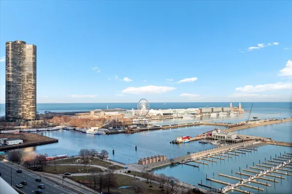 a room with lots of furniture and white walls