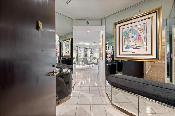 a view of a hallway with a couch