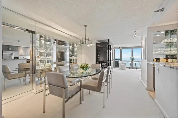 a view of a dining room with furniture