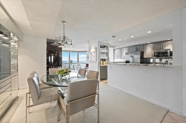 a view of a dining room kitchen and a window