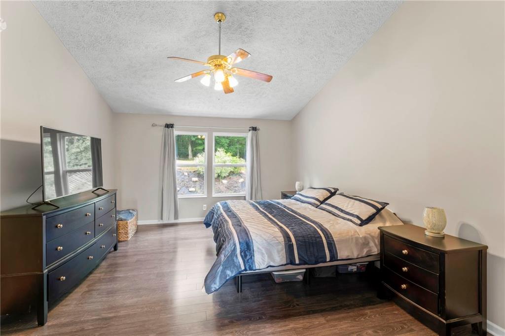 553 Hoover Drive Apollo, PA 15613 - Photo 18 of 35 a bedroom with a bed and a chandelier