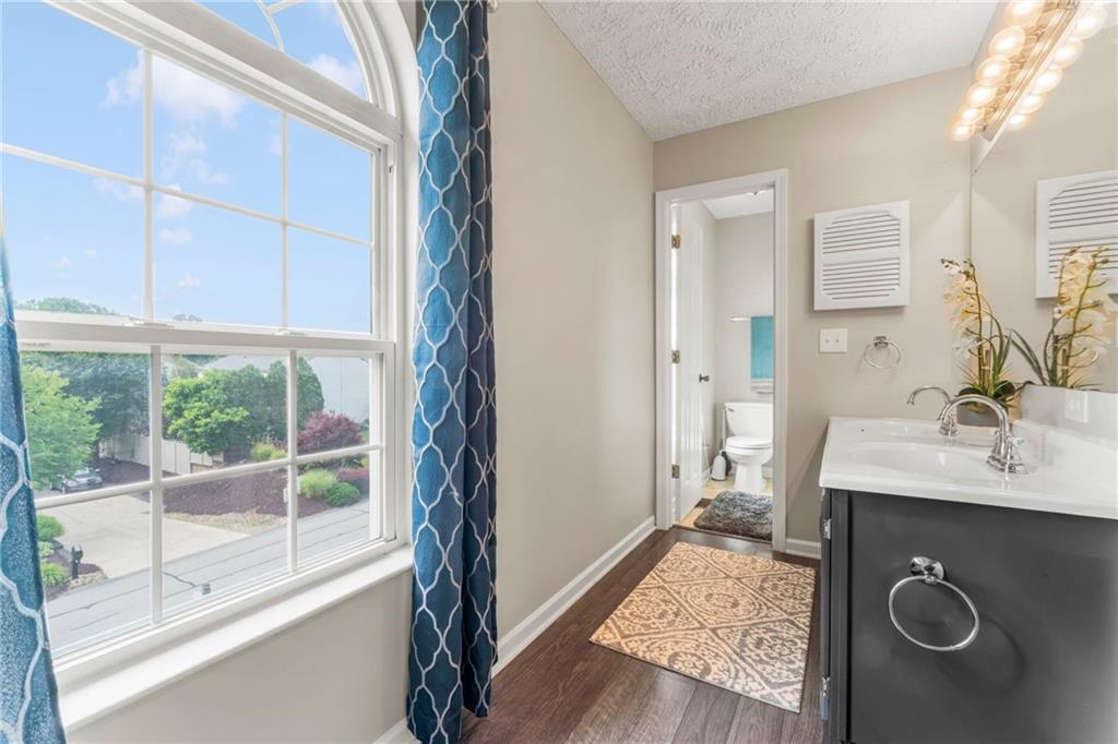553 Hoover Drive Apollo, PA 15613 - Photo 22 of 35 a bathroom with a sink and a mirror