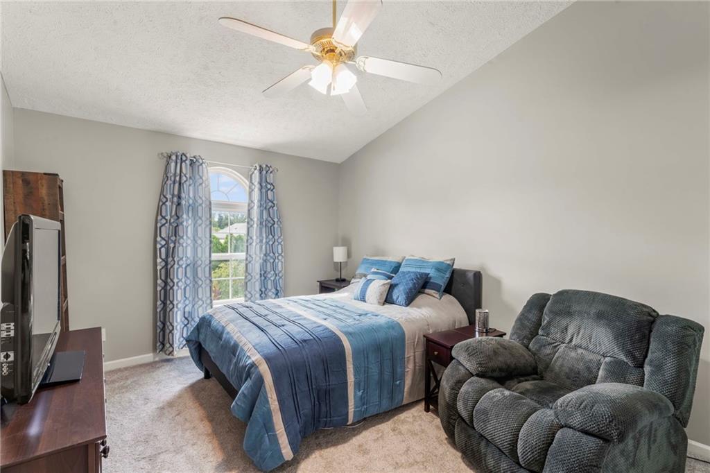 553 Hoover Drive Apollo, PA 15613 - Photo 23 of 35 a bedroom with bed couch and window