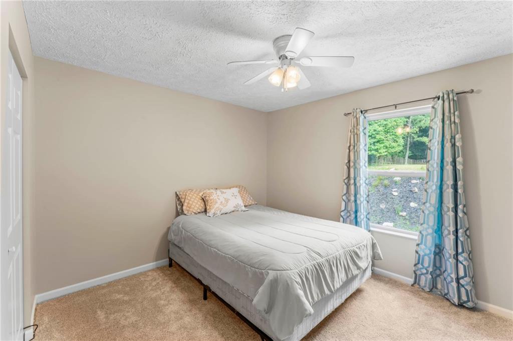 553 Hoover Drive Apollo, PA 15613 - Photo 27 of 35 a bedroom with a bed and window