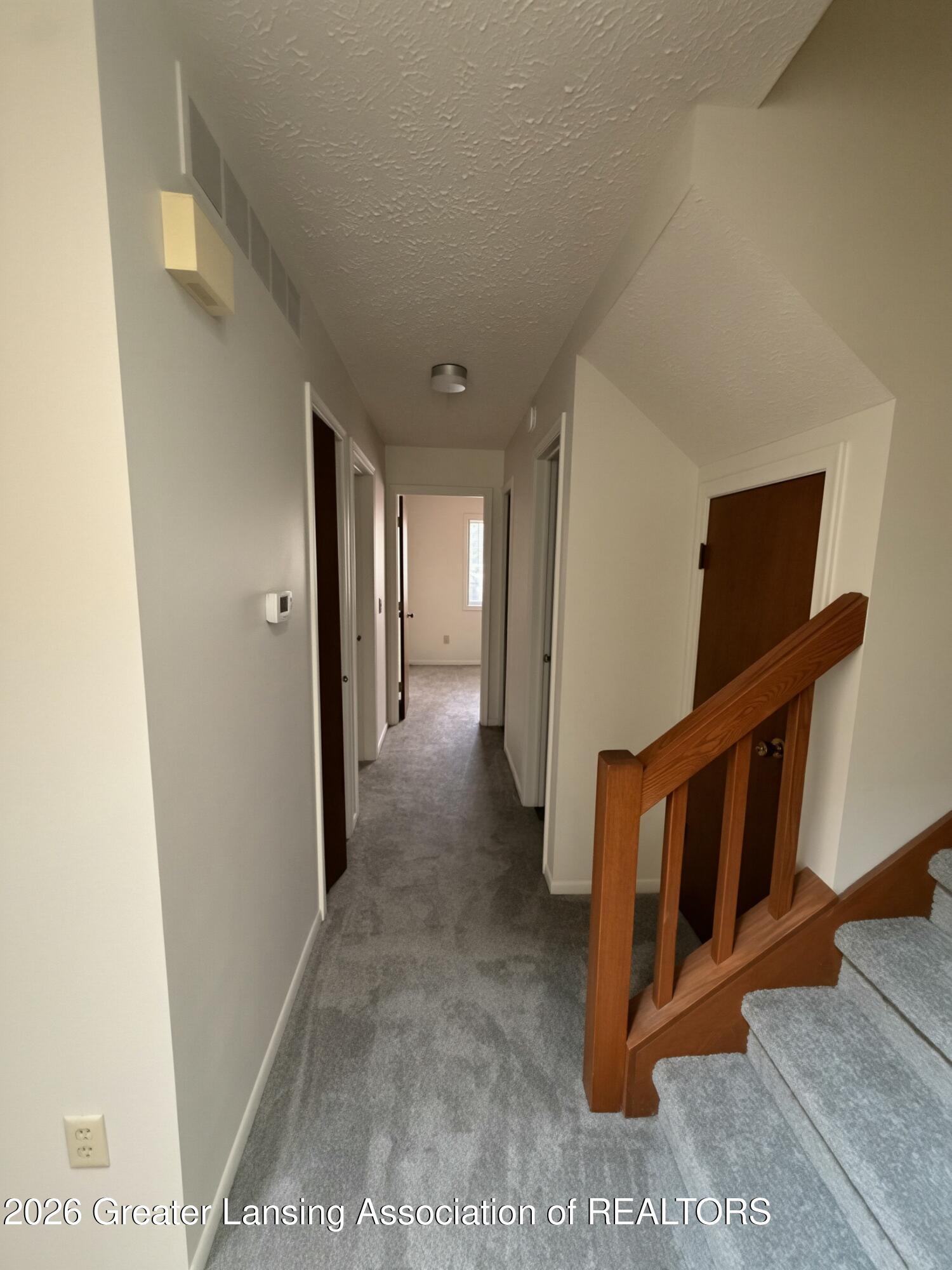 205 East Jolly Road, Unit 12 Lansing, MI 48910 - Photo 9 of 31 0D52D68B-76B0-4E48-BE9F-4A4683EF696A (1)