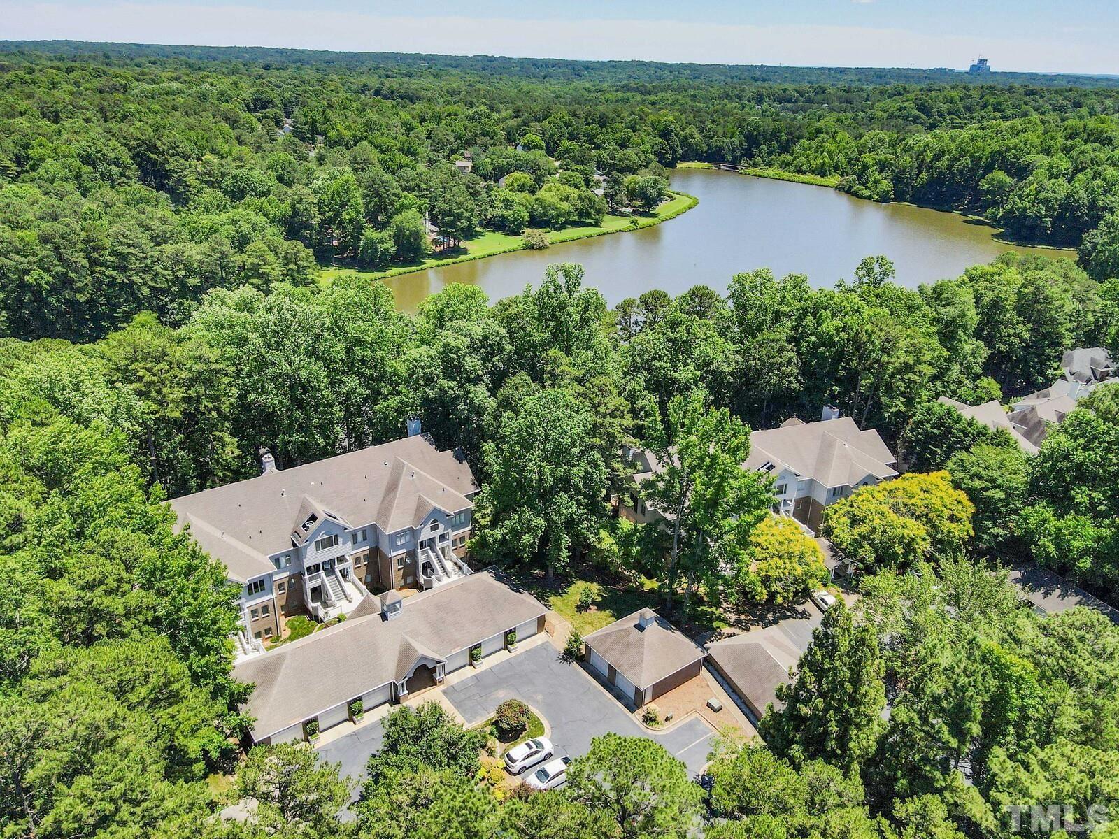 an aerial view of a house with outdoor space and street view