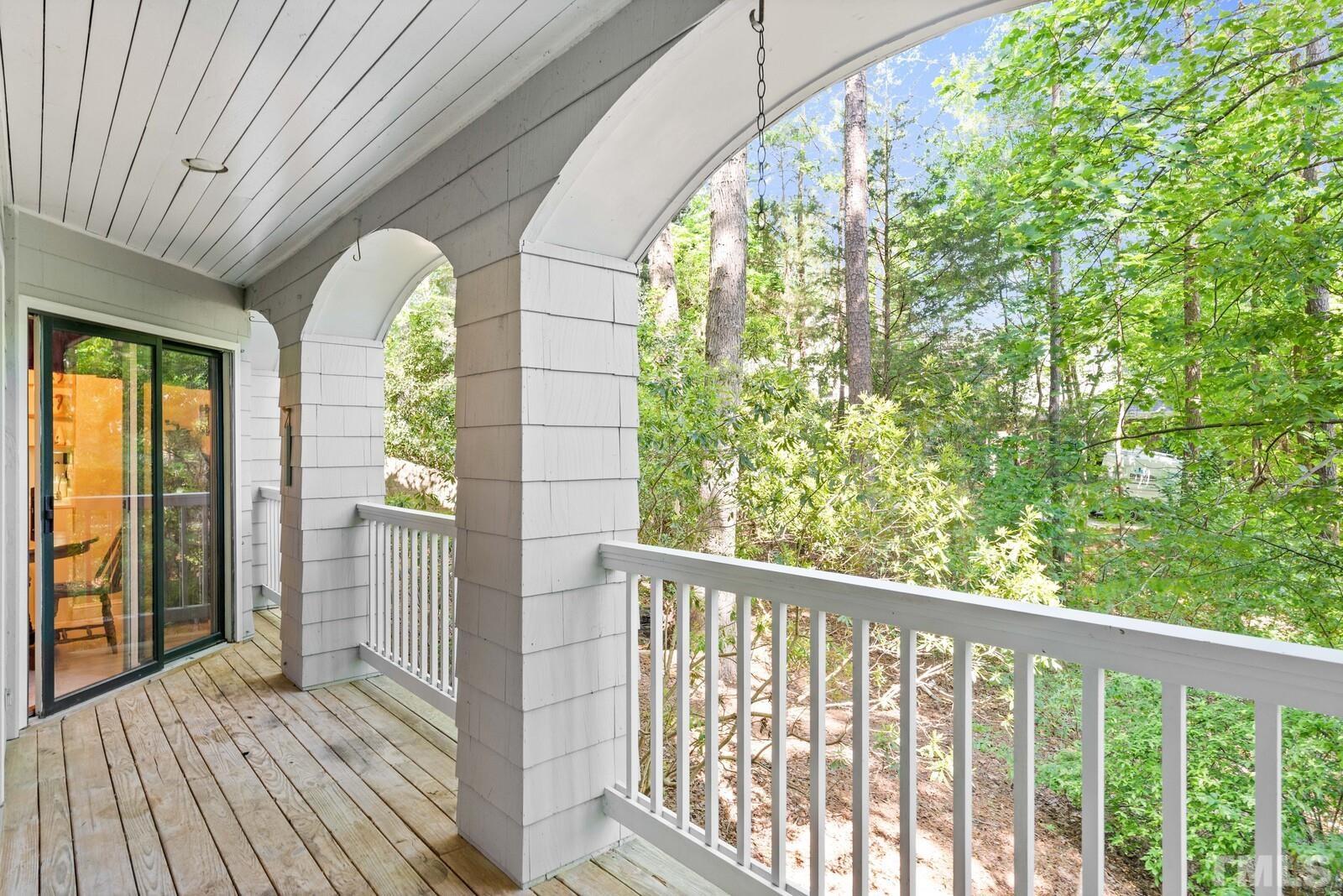 7500 Cadbury Court, Unit 101 Raleigh, NC 27615 - Photo 13 of 41 a view of a porch with wooden floor and outdoor space