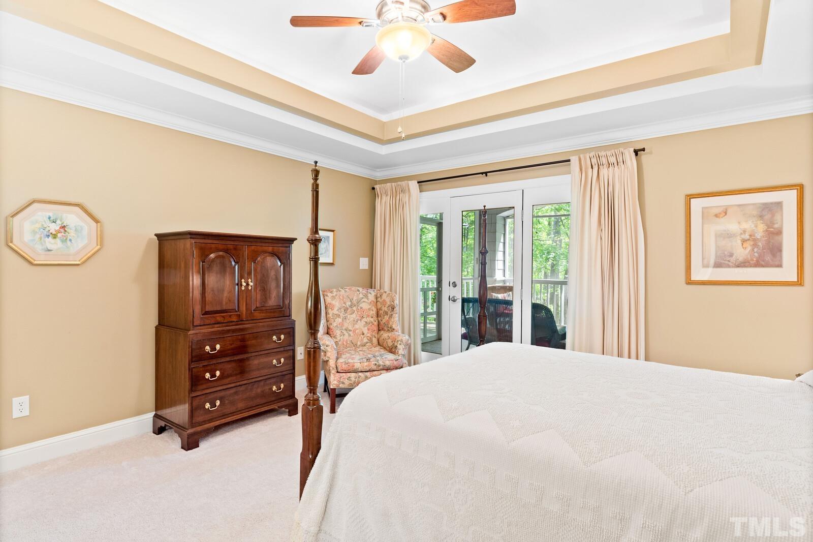 7500 Cadbury Court, Unit 101 Raleigh, NC 27615 - Photo 19 of 41 a bed room with a bed and a dresser