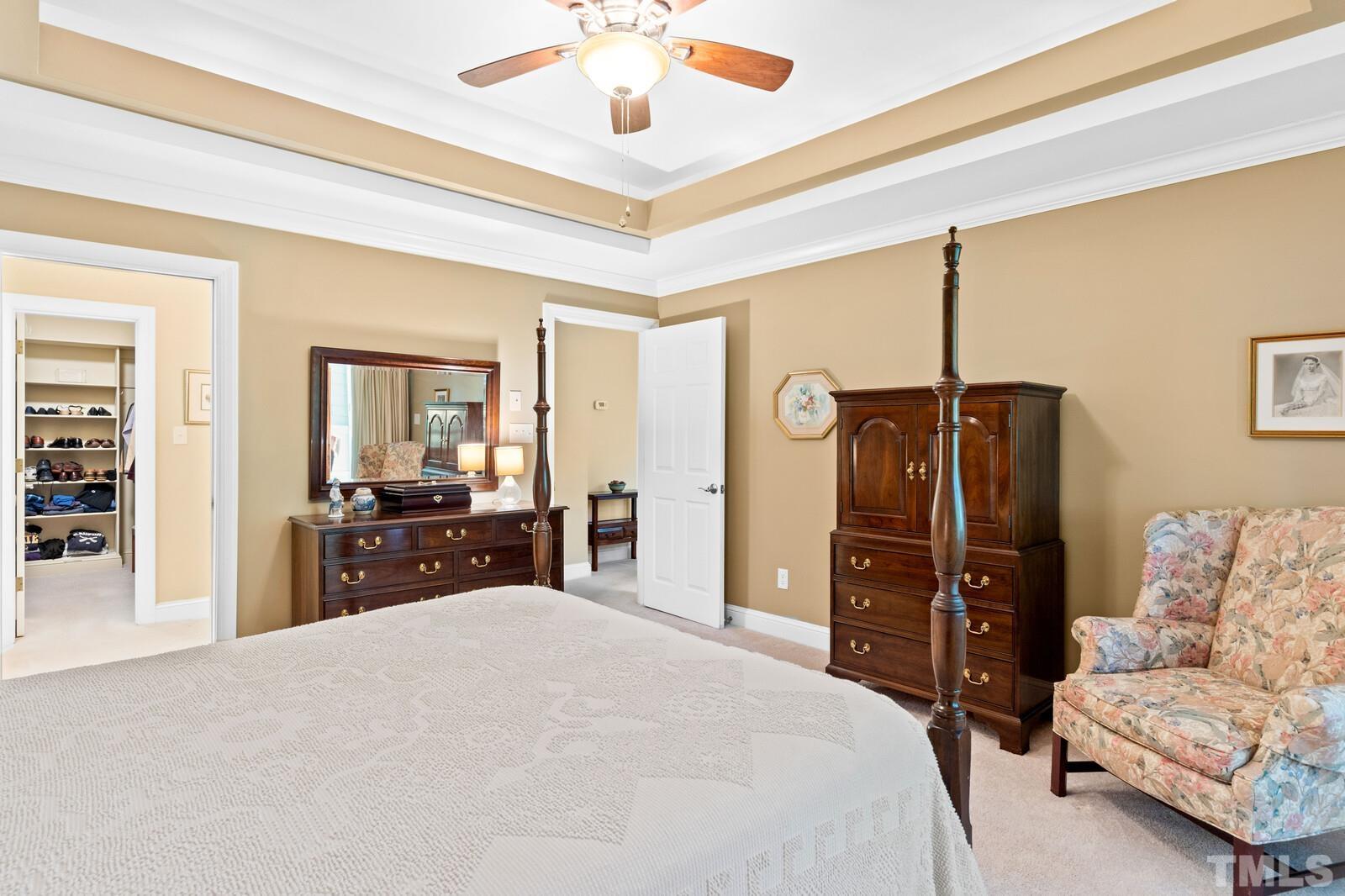 7500 Cadbury Court, Unit 101 Raleigh, NC 27615 - Photo 20 of 41 a bedroom with a bed and furniture