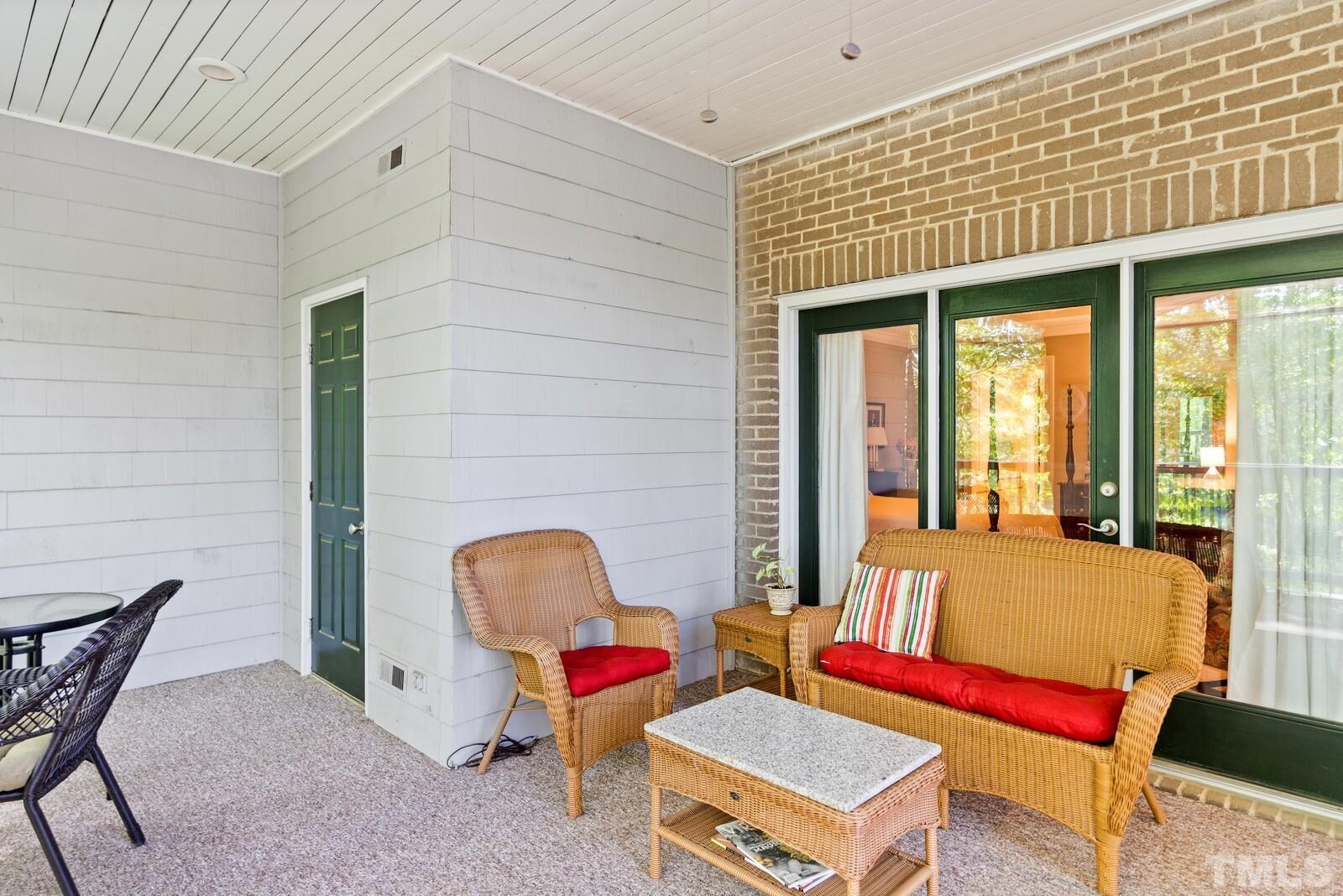 7500 Cadbury Court, Unit 101 Raleigh, NC 27615 - Photo 27 of 41 a living room with furniture and a window