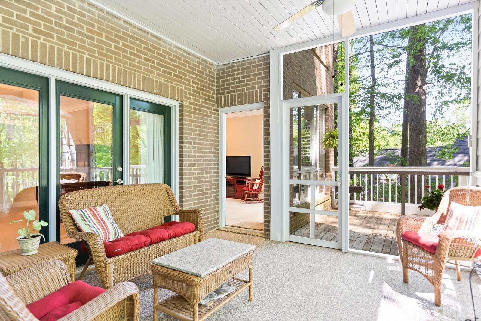 7500 Cadbury Court, Unit 101 Raleigh, NC 27615 - Photo 28 of 41 a living room with furniture and a large window