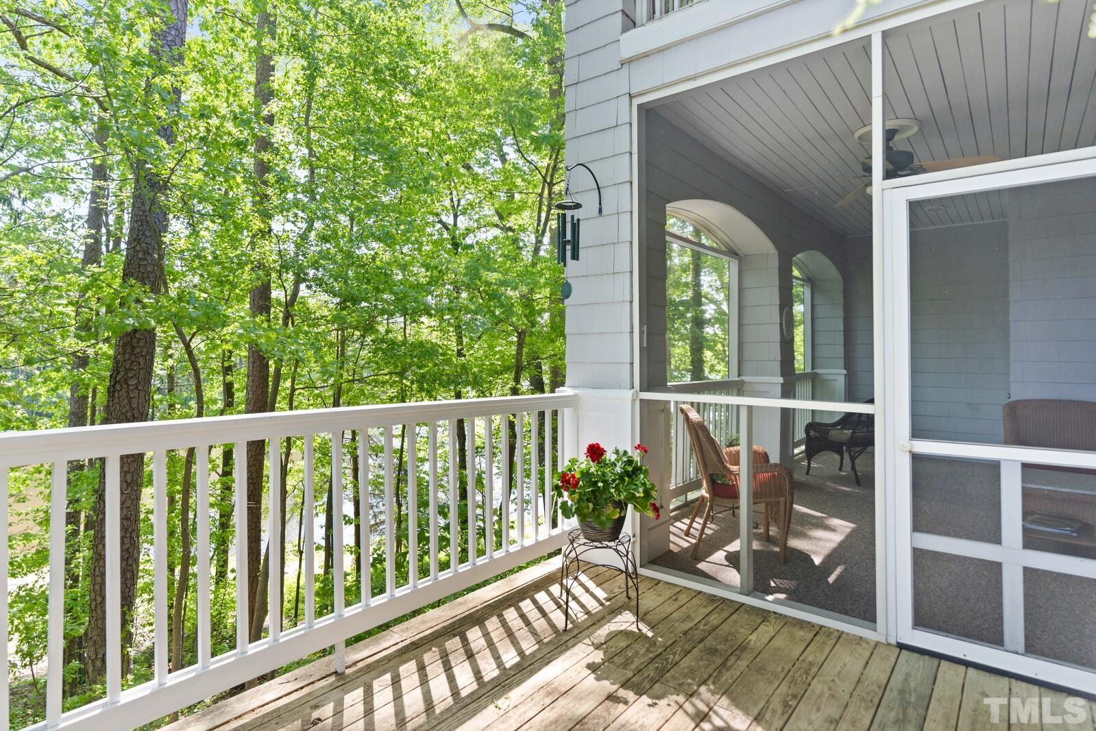 7500 Cadbury Court, Unit 101 Raleigh, NC 27615 - Photo 30 of 41 a view of a balcony with wooden floor