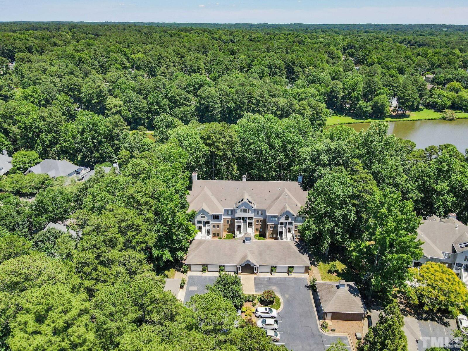 7500 Cadbury Court, Unit 101 Raleigh, NC 27615 - Photo 34 of 41 an aerial view of a house with pool outdoor seating and yard