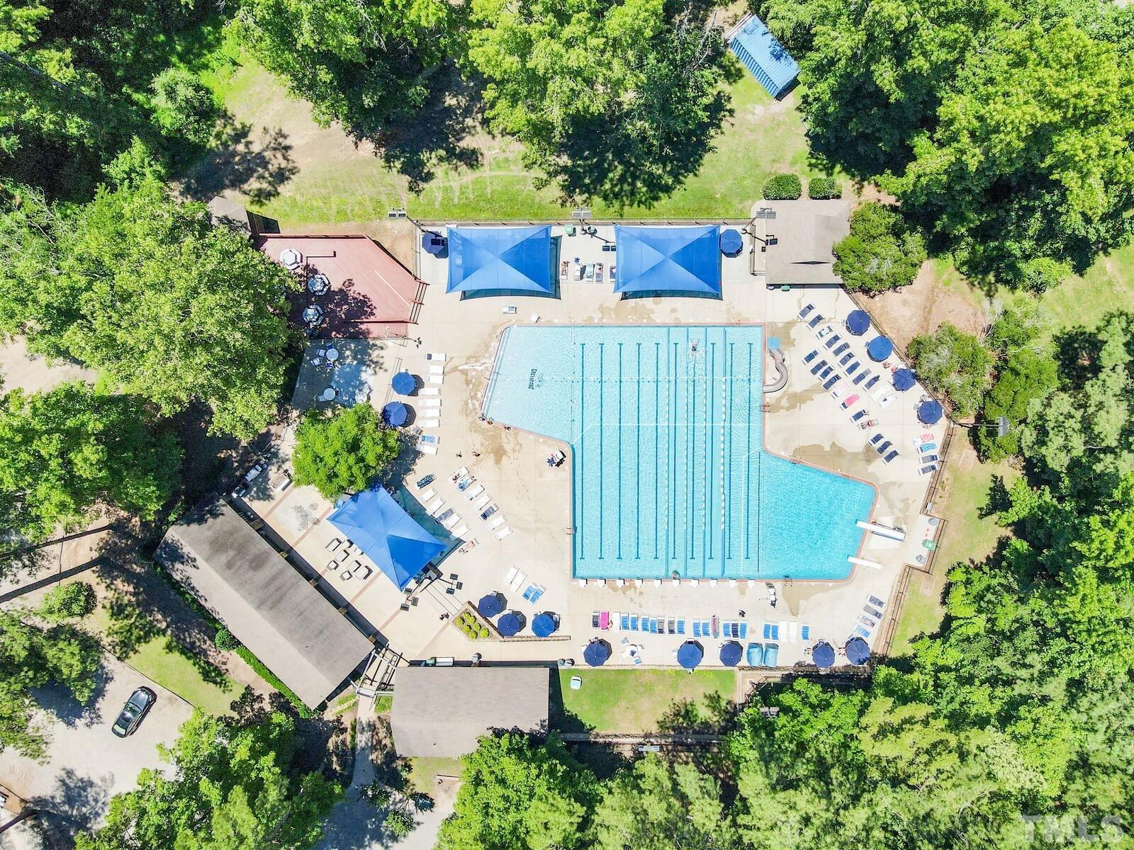 7500 Cadbury Court, Unit 101 Raleigh, NC 27615 - Photo 37 of 41 an aerial view of a house with a yard and garden