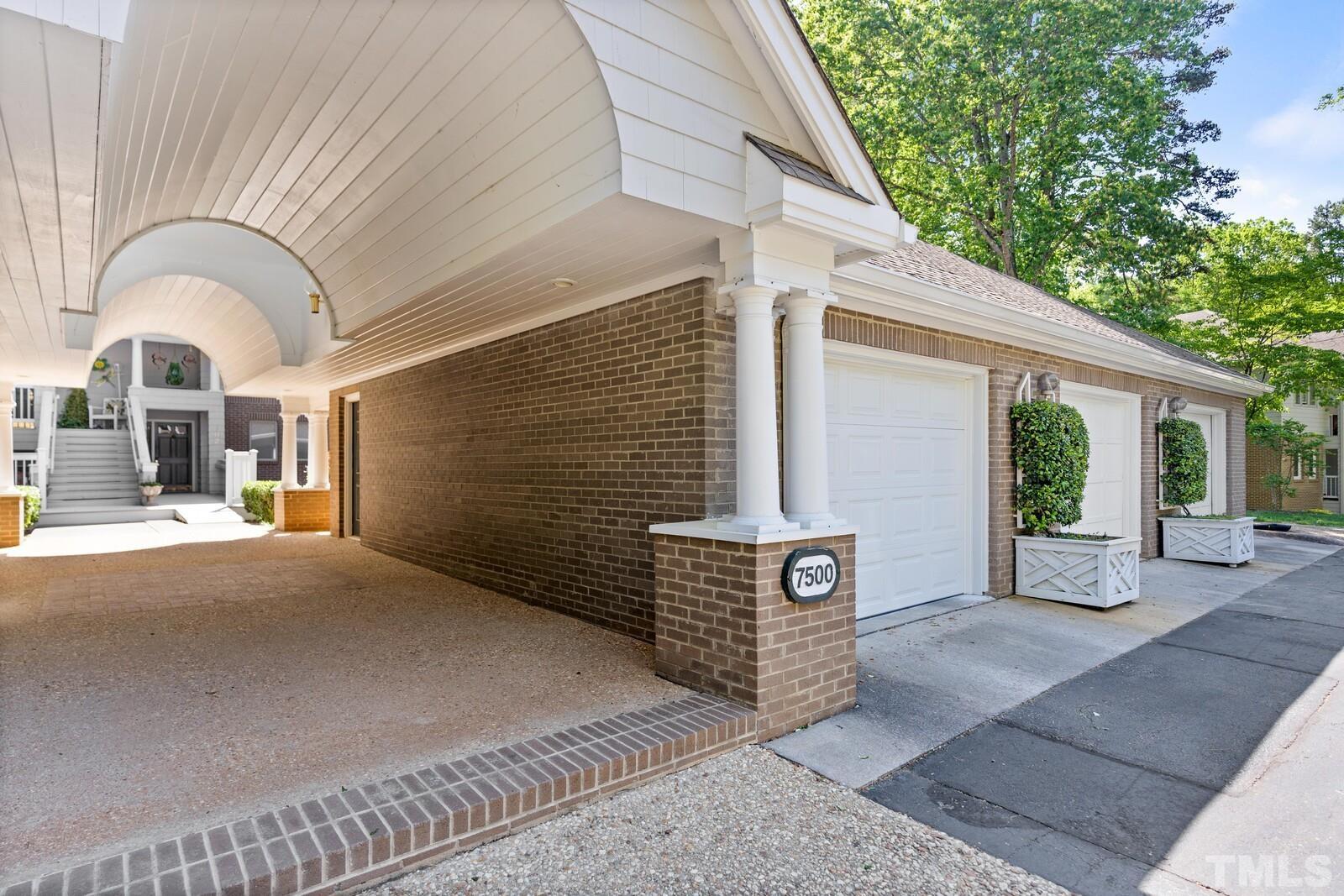 7500 Cadbury Court, Unit 101 Raleigh, NC 27615 - Photo 39 of 41 a front view of a house with garden