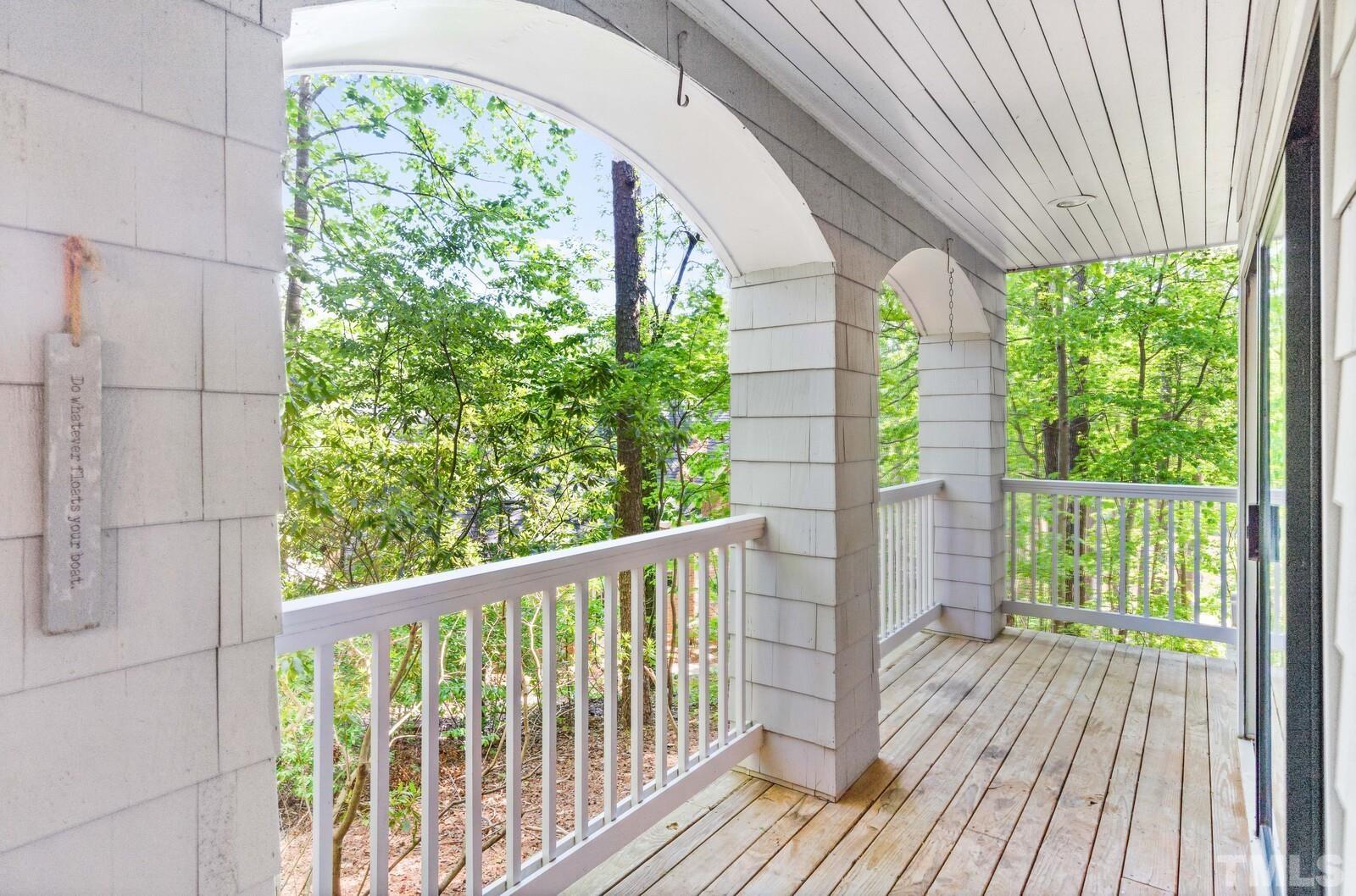 7500 Cadbury Court, Unit 101 Raleigh, NC 27615 - Photo 10 of 41 a view of balcony with wooden floor