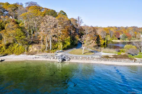a view of a yard with table and chairs