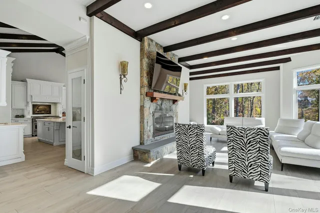 a living room with furniture and a window