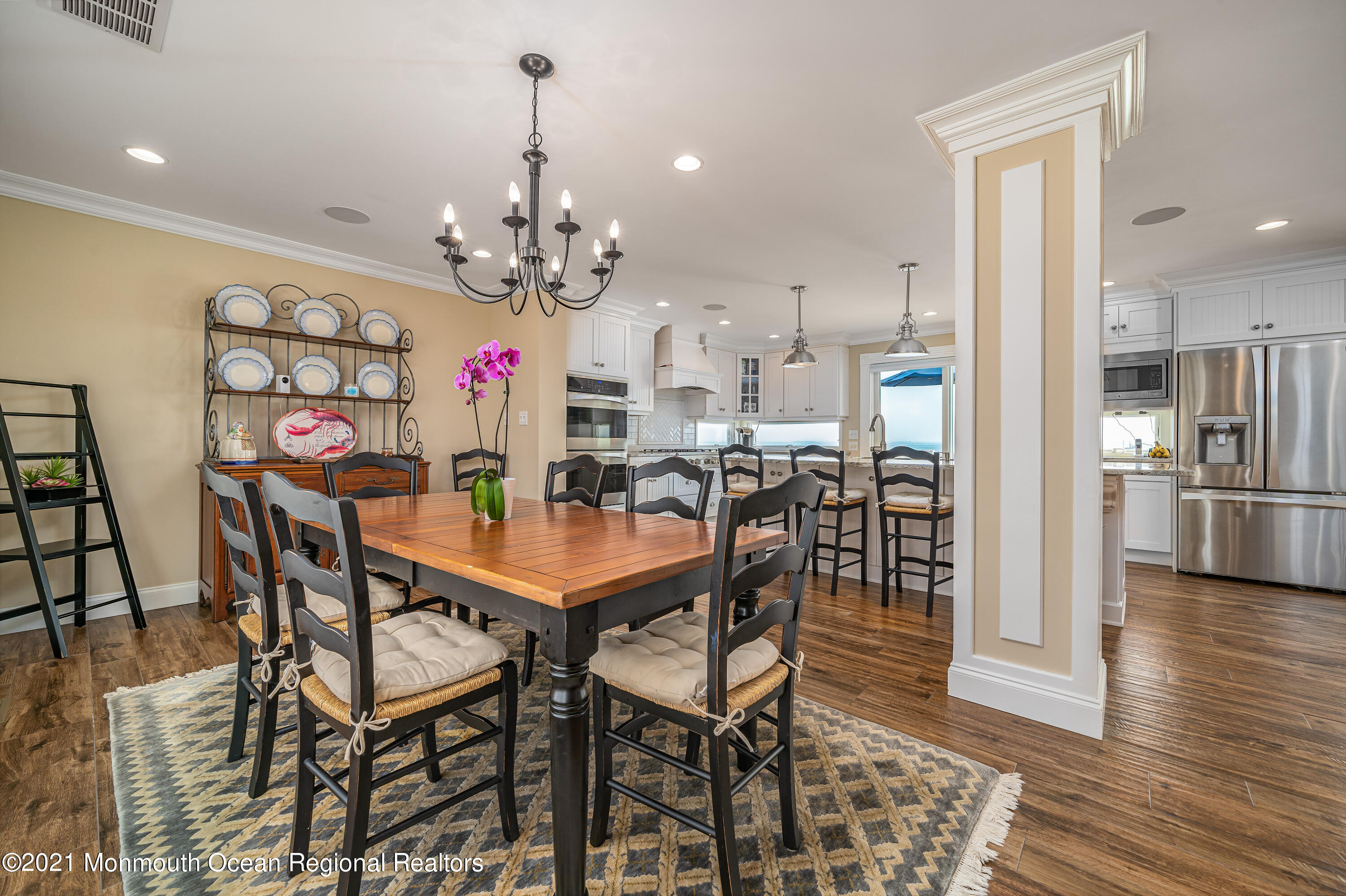 117 Clifton Road Barnegat, NJ 08005 - Photo 14 of 44 a view of a dining room with furniture and a chandelier
