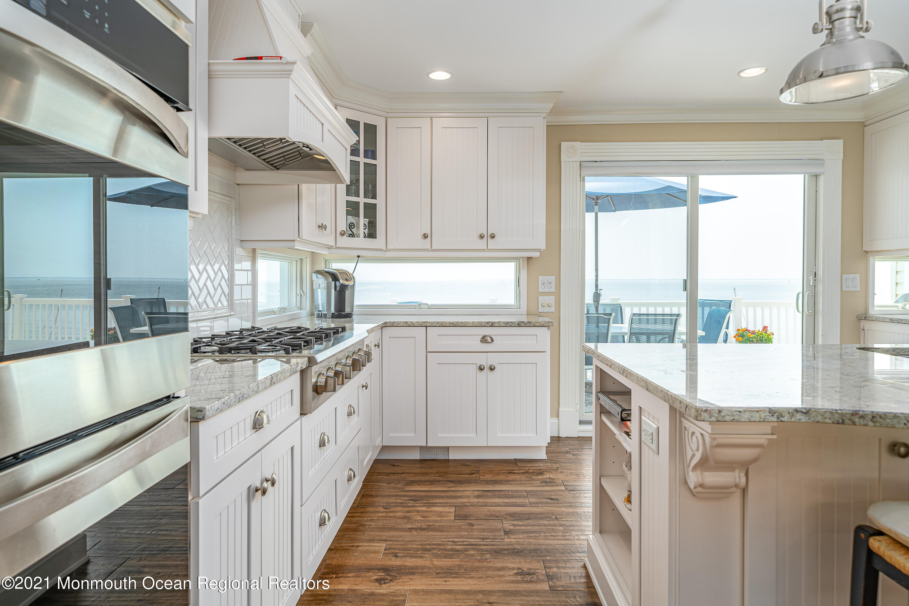 117 Clifton Road Barnegat, NJ 08005 - Photo 16 of 44 a kitchen with stainless steel appliances granite countertop a stove and a refrigerator