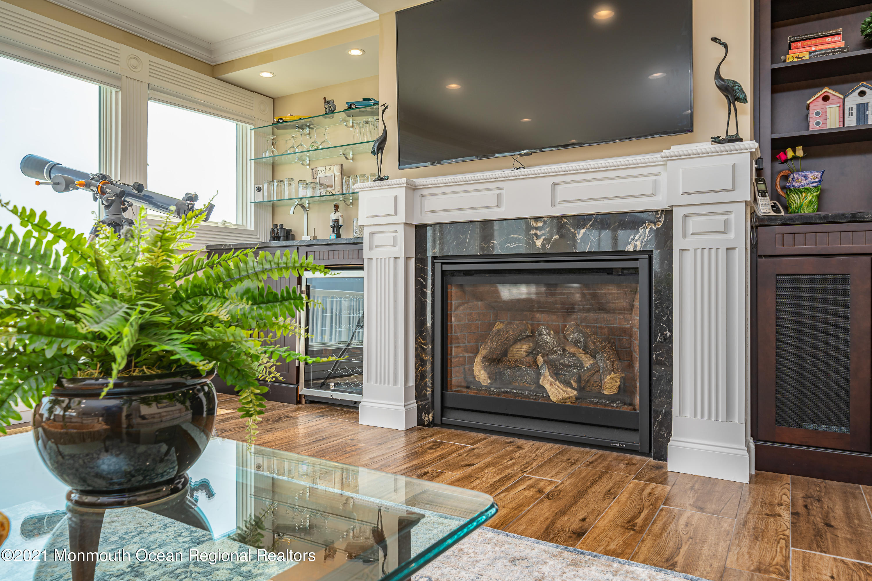 117 Clifton Road Barnegat, NJ 08005 - Photo 22 of 44 a living room with furniture and a fireplace