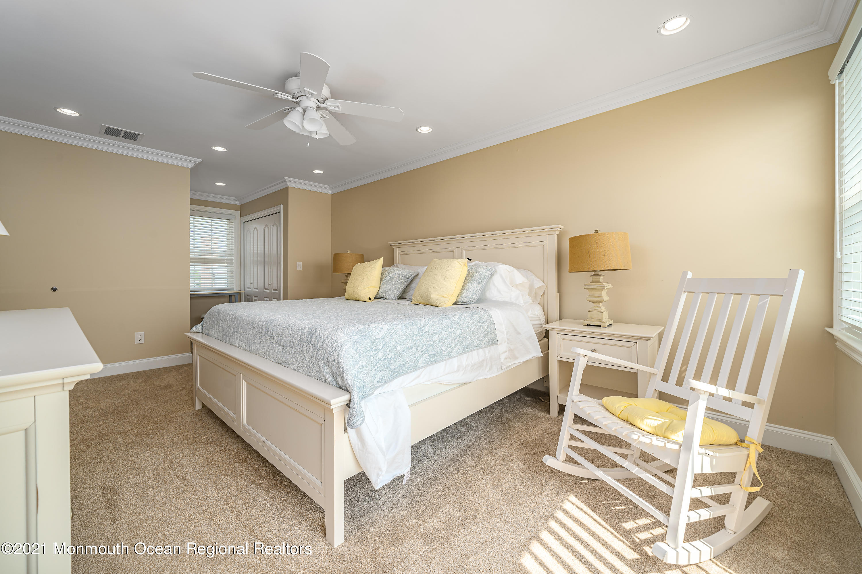 117 Clifton Road Barnegat, NJ 08005 - Photo 24 of 44 a bedroom with a bed and a chair