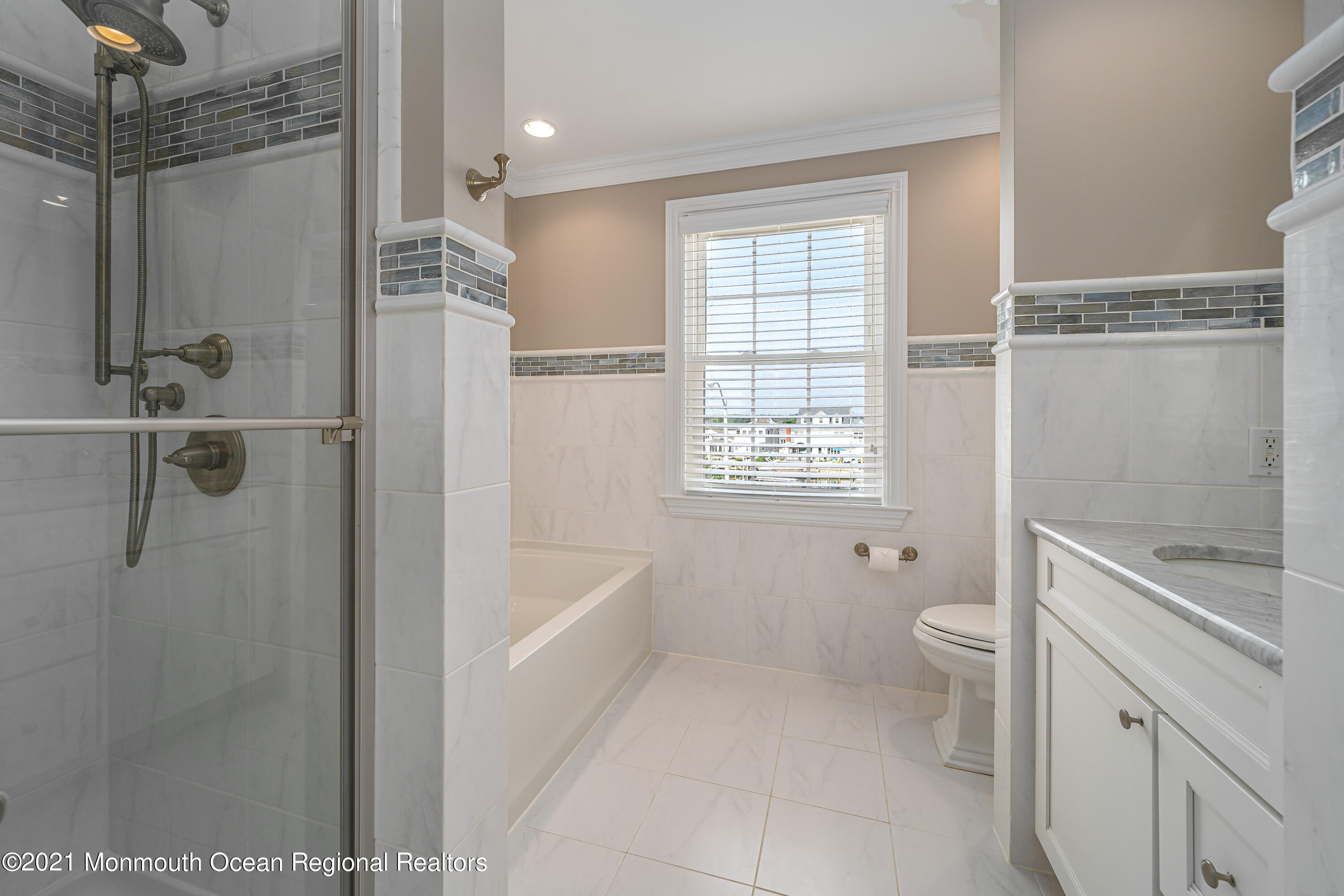 117 Clifton Road Barnegat, NJ 08005 - Photo 25 of 44 a bathroom with a granite countertop sink a toilet and shower