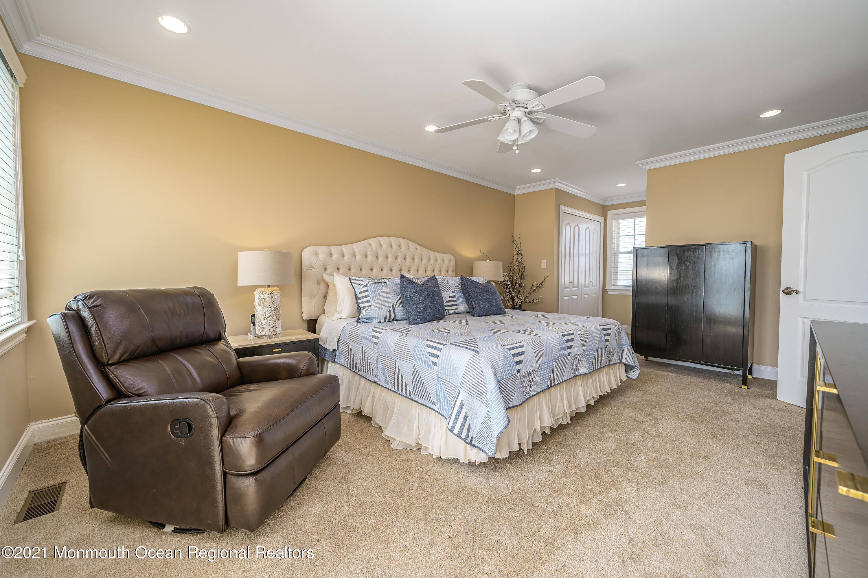 117 Clifton Road Barnegat, NJ 08005 - Photo 30 of 44 a bedroom with a bed couch and ceiling fan